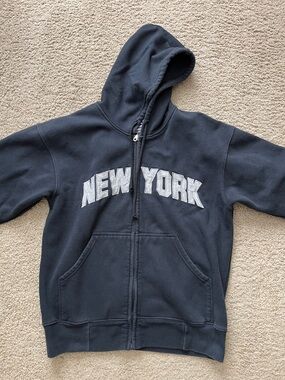 Men’s Okey Dokey brand New York zip up hoodie. Black. Slight wear-left hem.